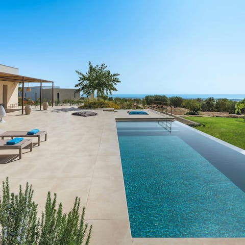 Soak up the stunning sea view from the private pool