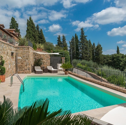 Find peace and relaxation while lounging by the pool