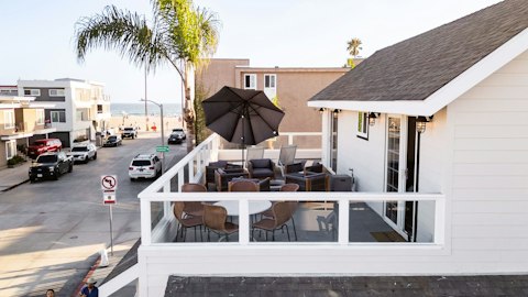 Sit out on the terrace with the beach just steps away