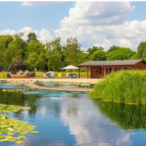 Take a refreshing dip in the natural swimming pond