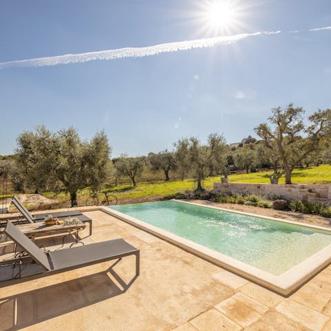 Savour the scenery from a spot by the pool