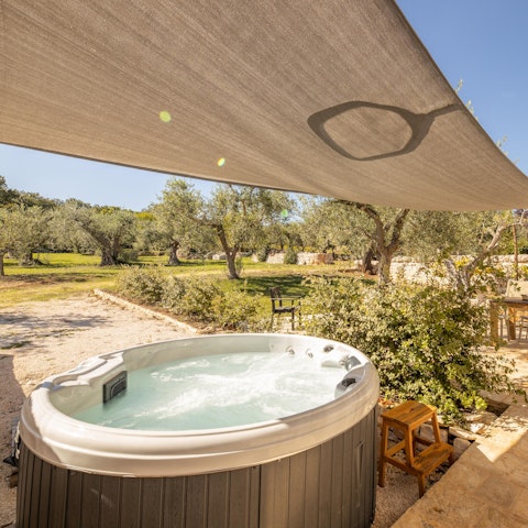 Unwind in the hot tub while admiring the view
