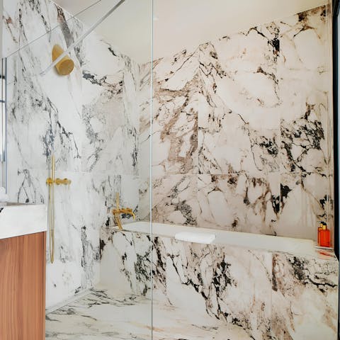 Soak in the opulent bathtub after a day of sightseeing