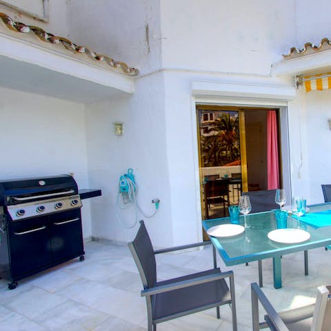 Fire up the barbecue and get a group feast on the go on the terrace