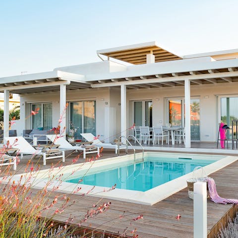 Lounge on the pool terrace before rustling up a Sicilian barbecue lunch