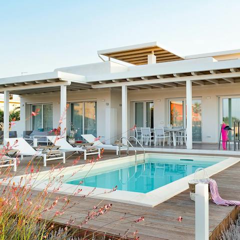 Lounge on the pool terrace before rustling up a Sicilian barbecue lunch