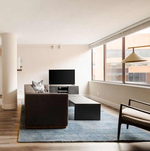 Kick back in the bright living room with a cold beer after a day of sightseeing