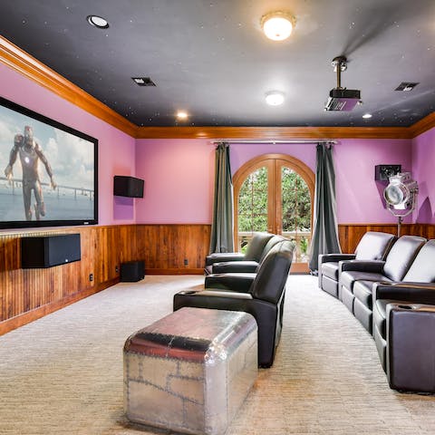 Watch your favourite film in the movie theatre with its ceiling full of stars and built-in bar