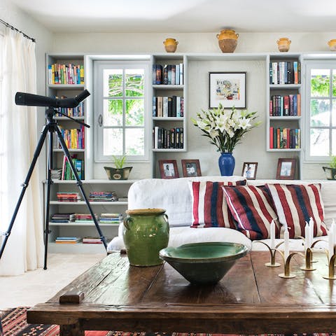 Grab a book from the library and unwind in comfy couches