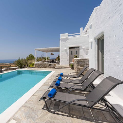 Lie back on a sun lounger with a cocktail after a few laps in the pool