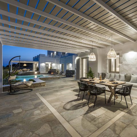 Dine in style under the covered terrace on a balmy evening