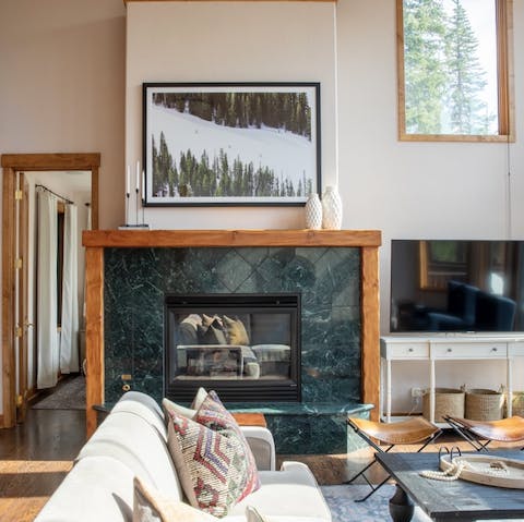 Gather around the beautiful working fireplace in the main lounge