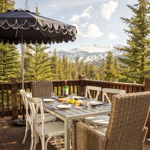Dine outside with an incredible mountain view before you