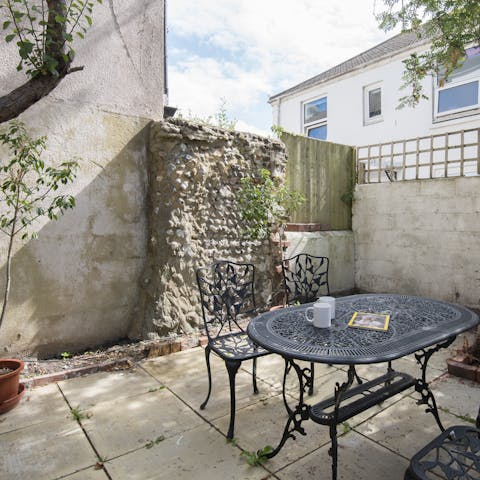 Sip coffee in your private courtyard garden