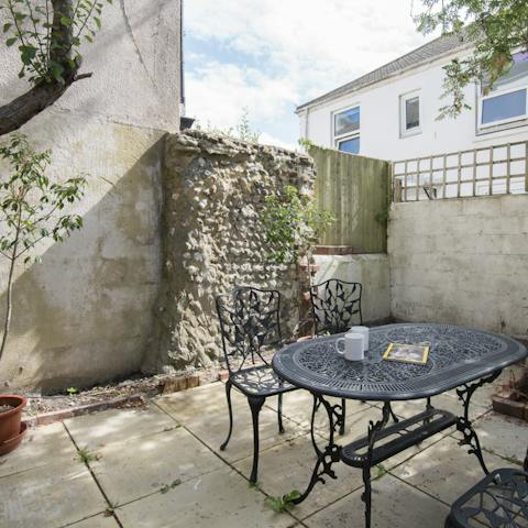 Sip coffee in your private courtyard garden