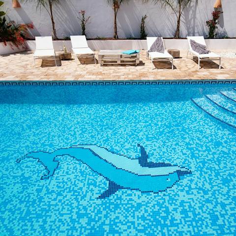 Relax by the pool before taking a refreshing dip