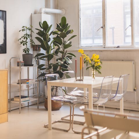 Tuck into a curry around the modern dining table