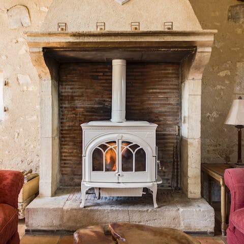 Put some kindling into the log-burner and watch a blockbuster on the home cinema setup