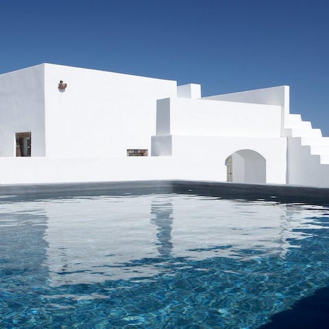 Splash about in the villa's pool that sits in the middle of each separate home