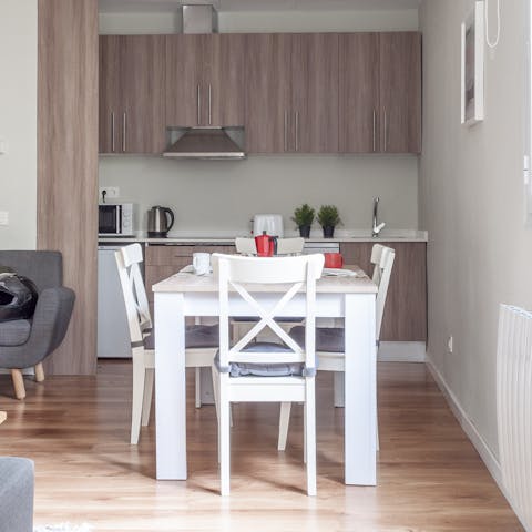 Start mornings with fresh coffee and pastries in the bright living area before setting off to explore the city