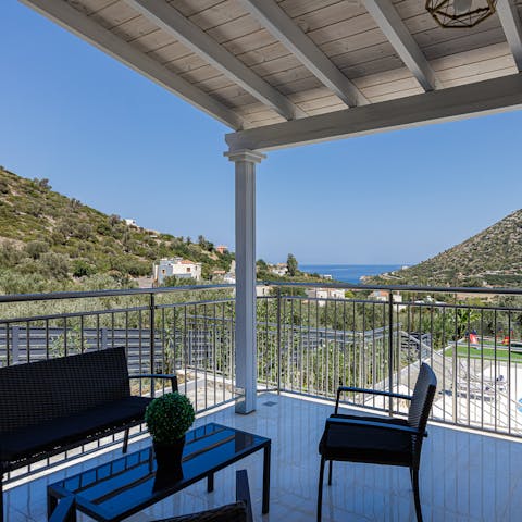 Enjoy a chilled drink on your private balcony as you watch the sun go down