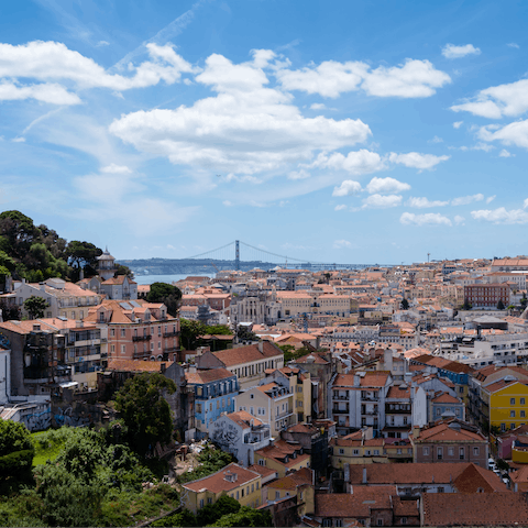 Look out over the city rooftops from your hilltop location in Graça