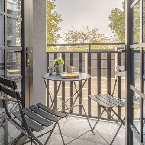 Enjoy a cup of coffee on your private balcony