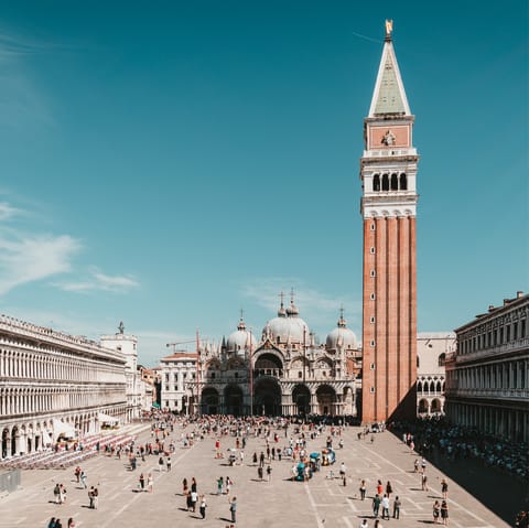 Stroll down to the grandiose and lively St Mark's Square