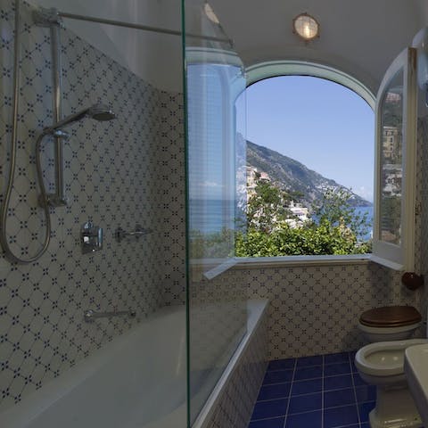 Unwind in the bathtub while taking in the dreamy surrounding setting