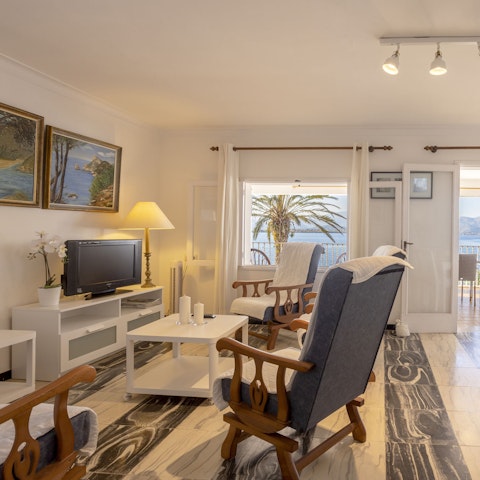 Enjoy evenings of movies in the bright and spacious living area