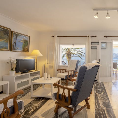 Enjoy evenings of movies in the bright and spacious living area