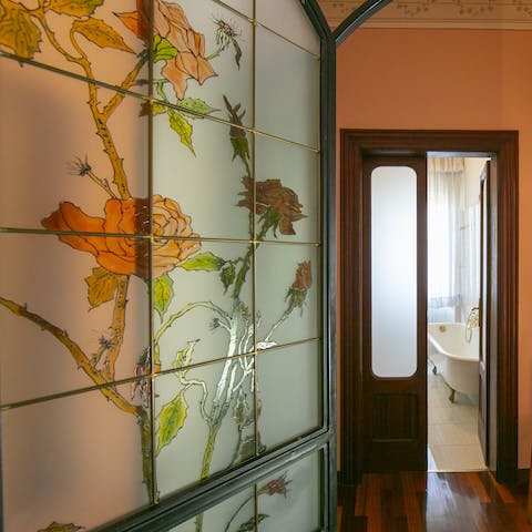 Admire the beautiful stained glass in the hallway