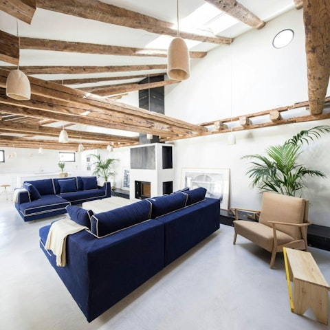 Unwind together in this bright and quirky penthouse apartment