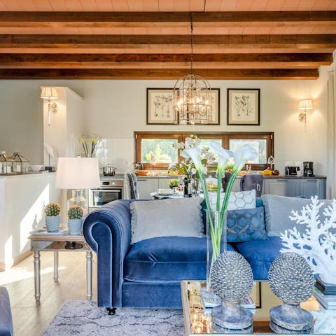 Make yourself at home in the chic, coastal-inspired living area