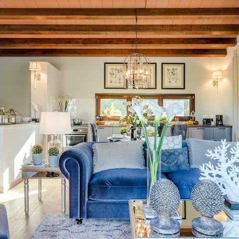 Make yourself at home in the chic, coastal-inspired living area