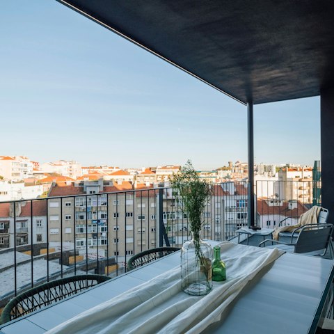 Sip Port on the terrace as the sun sinks in the sky