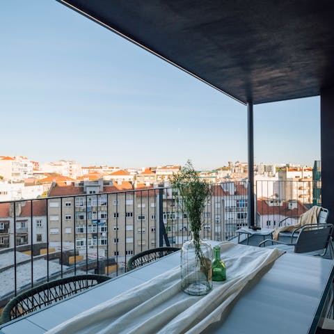 Sip Port on the terrace as the sun sinks in the sky