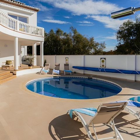 Cool off from the sun in the private pool