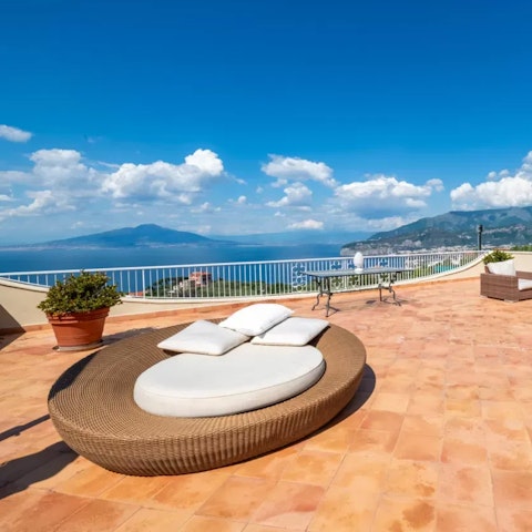 Soak up the sun and sea views on the terrace