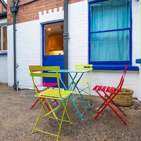 Catch the last of the day's sunshine from the home's patio