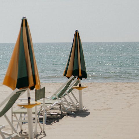 Pack a beach bag and stroll down to the seafront in Viareggio