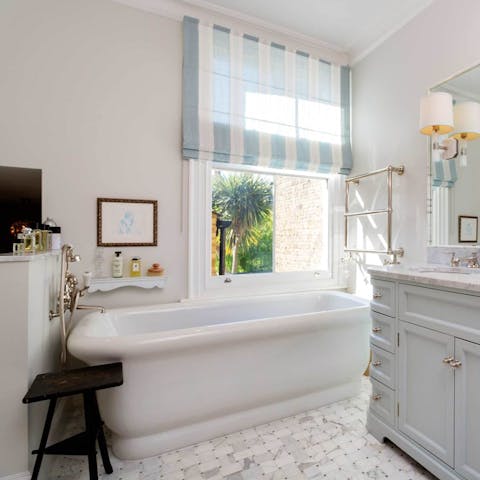 Treat yourself to a long, hot soak in the roll top bath