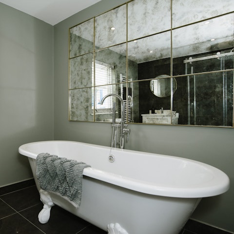 Treat yourself to a long soak in the clawfoot tub after an exhilarating day by the coast