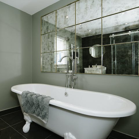 Treat yourself to a long soak in the clawfoot tub after an exhilarating day by the coast