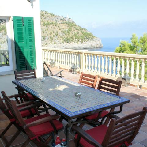 Enjoy a lazy lunch with sea views on the terrace