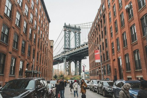 Explore DUMBO's cobblestone streets, galleries, and bridge views, just fifteen minutes on foot