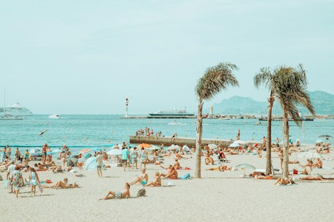 Sprawl out on Cannes' sandy waterfront, not far on fot