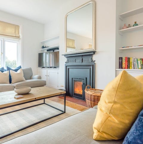 Spend cosy evenings reading or watching films by the fire