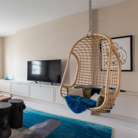 Find your inner child on the swing seat in the living room