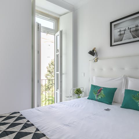 Open the French doors and enjoy a warm breeze from the comfort of your bed